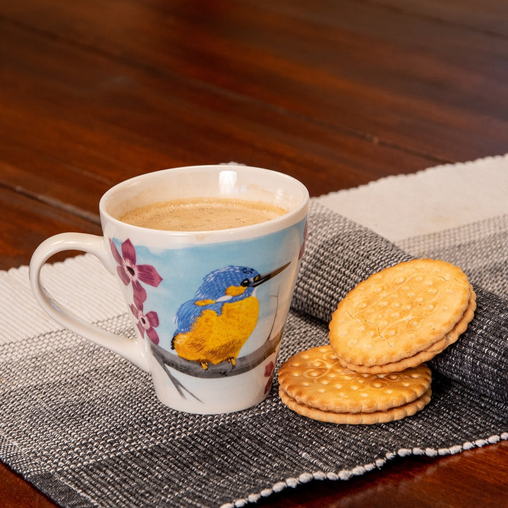 Kingfisher bird illustration on white ceramic mug designed by Myrte