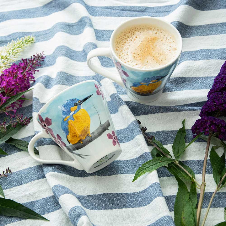 Kingfisher bird illustration on white ceramic mug designed by Myrte