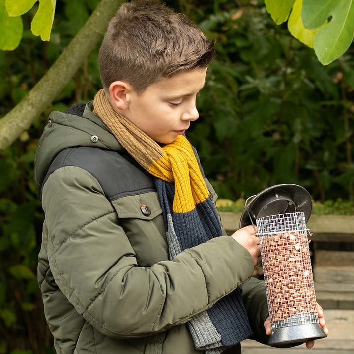 CJ Wildlife Adventurer Metal Peanut Bird Feeder being filled